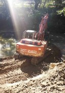 Fiumi puliti - escavatore